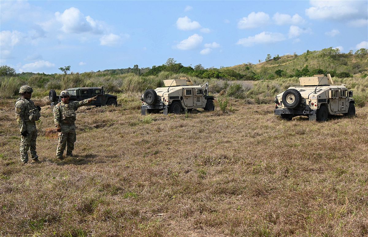 <i>Ted Aljibe/AFP/Getty Images/File</i><br/>US Army soldiers stand next to their Humvies prior to a live-fire exercise with Philippine troops at Fort Magsaysay in the Philippines on March 31.