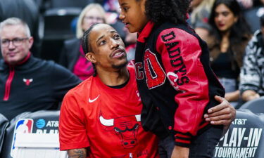 DeMar DeRozan embraces his daughter Diar before the game against the Toronto Raptors.