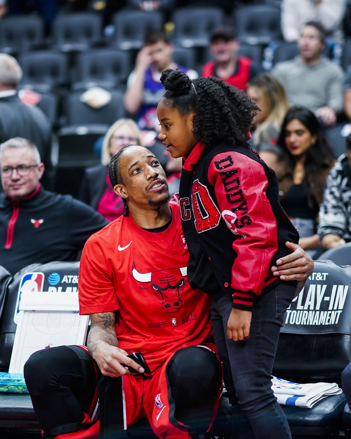 <i>Mark Blinch/NBAE/Getty Images</i><br/>DeMar DeRozan embraces his daughter Diar before the game against the Toronto Raptors.