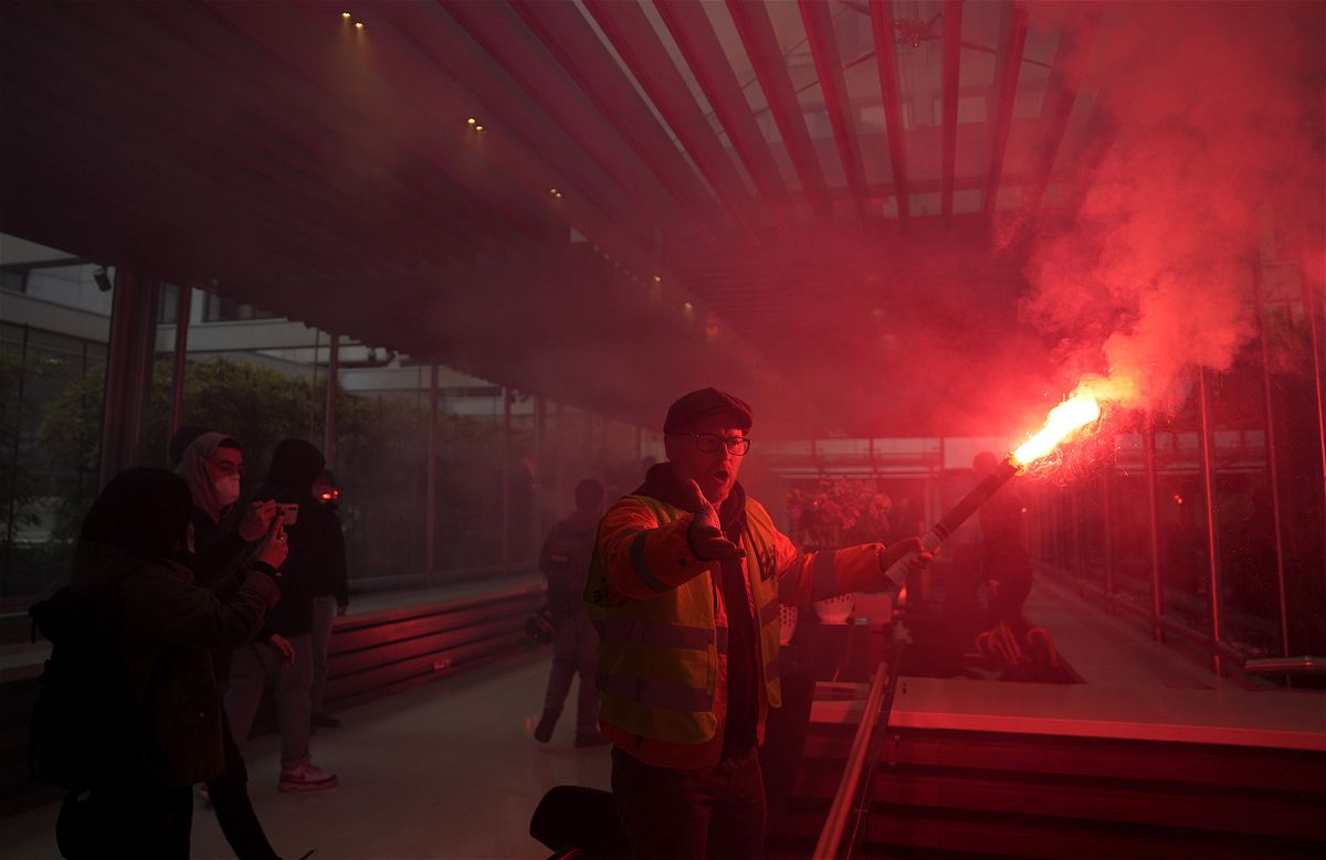 <i>Lewis Joly/AP</i><br/>Demonstrators storm the French luxury group LVMH's headquarters on Thursday in Paris.