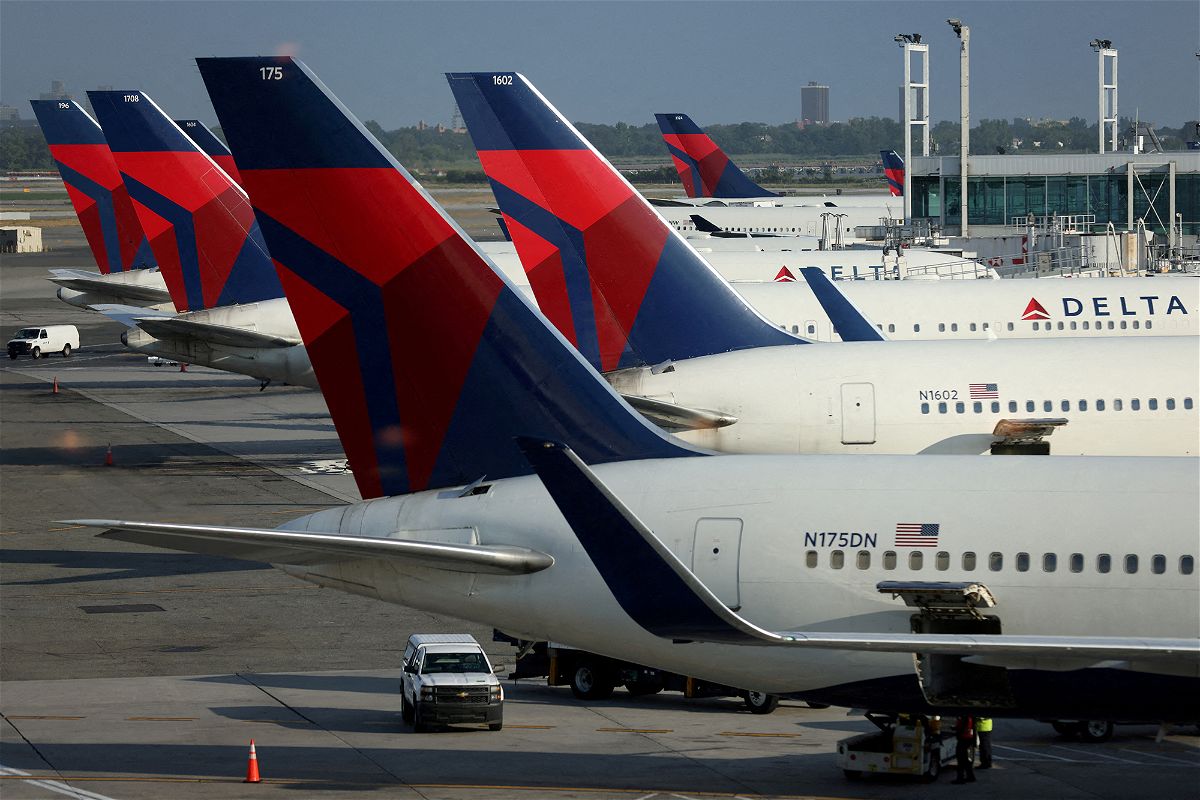 <i>Andrew Kelly/Reuters</i><br/>Delta Air Lines reported record advanced bookings for this coming summer. Delta planes are pictured at John F. Kennedy International Airport in 2022.