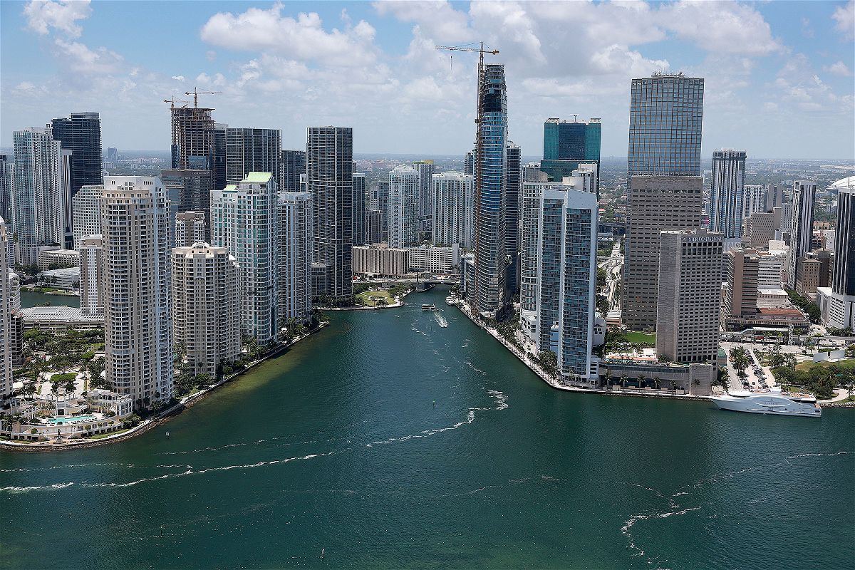 <i>Joe Raedle/Getty Images</i><br/>An aerial view of the City of Miami skyline is seen next to the waters of Biscayne Bay on July 21