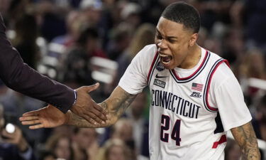 Hawkins celebrates during the second half of the men's national championship college basketball game against San Diego State.