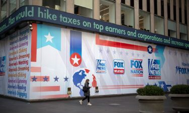 Jury selection is set to begin Thursday in Dominion Voting Systems' $1.6 billion defamation trial against Fox News. An advertisement for Fox News is pictured here last month outside the News Corp. building in New York.