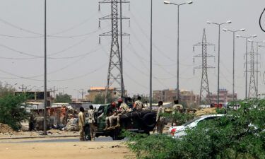Army soldiers deploy in Khartoum on April 15 amid reported clashes in the city. Sudan's paramilitaries said they were in control of several key sites following fighting with the regular army on April 15
