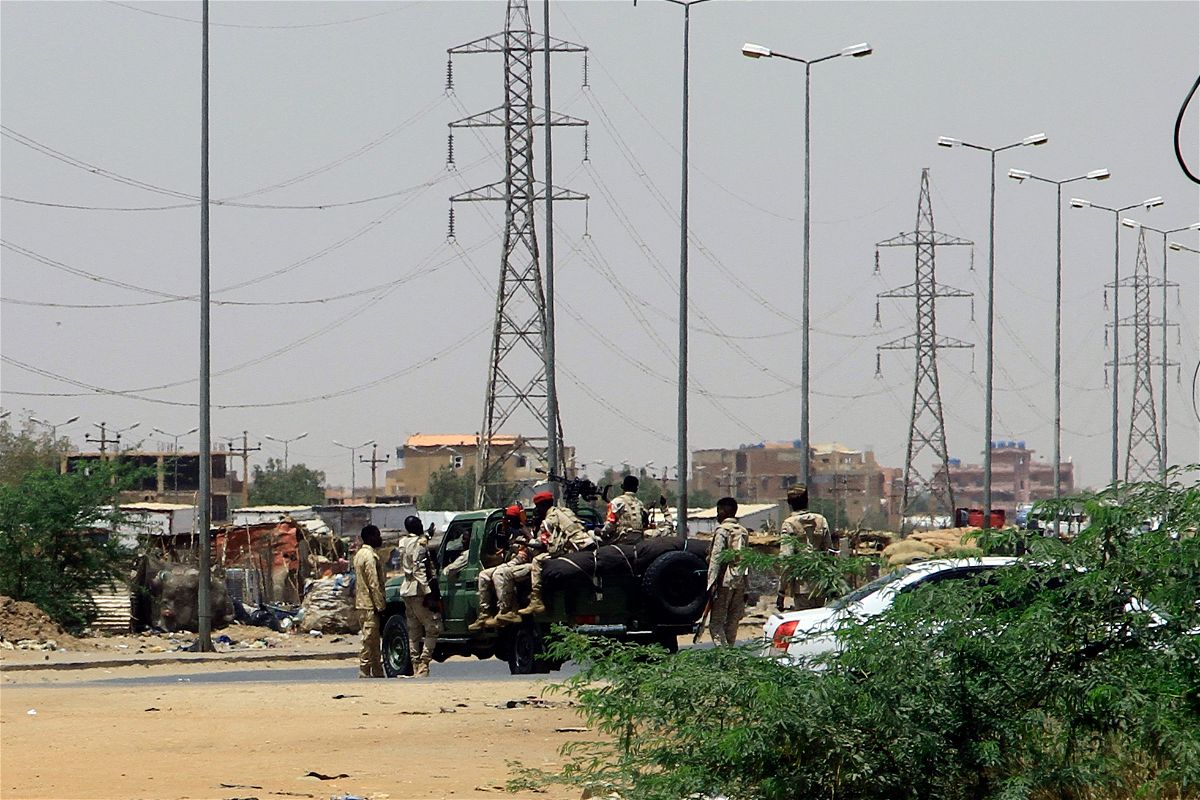 Army soldiers deploy in Khartoum on April 15 amid reported clashes in the city. Sudan's paramilitaries said they were in control of several key sites following fighting with the regular army on April 15