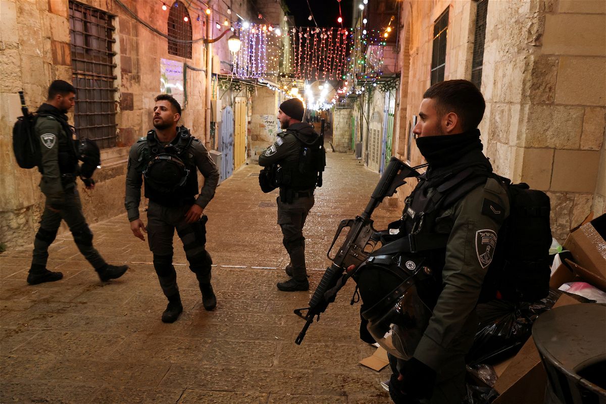 <i>Ammar Awad/Reuters</i><br/>Israeli police stand guard following the fatal shooting of a Palestinian man near the Al-Aqsa compound