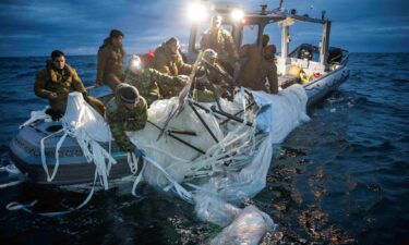 The Chinese spy balloon that transited the US earlier this year was able to collect intelligence from US military sites. The recovered balloon is pictured here off the coast of South Carolina