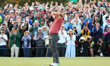 Jon Rahm celebrates on the 18th green after winning the 2023 Masters.