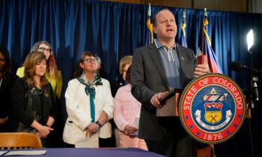 Colorado Gov. Jared Polis speaks at the State Capitol in Denver on April 14. Polis signed a trio of bills Friday that further protect the rights to abortion and gender-affirming services in the state.