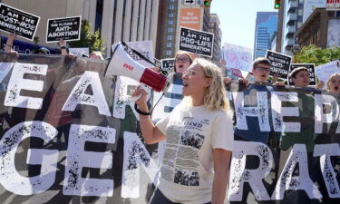 Anti-abortion activists march through downtown Columbus during the first Ohio March for Life in October 2022. An anti-abortion coalition in Ohio recently unleashed a $5 million ad buy targeting an effort to enshrine abortion rights in the state's constitution through a ballot initiative.