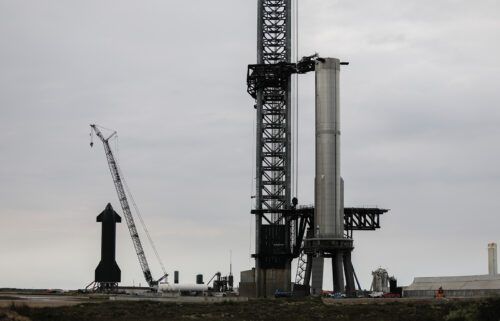 SpaceX workers on February 8 make final adjustments to Starship's orbital launch mount
