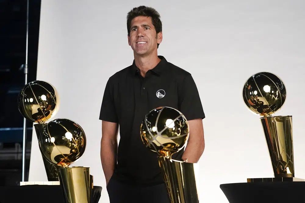 FILE - Golden State Warriors general manager Bob Myers poses for a photograph during an NBA basketball media day in San Francisco, Sunday, Sept. 25, 2022. Myers is departing as president and general manager of the Warriors after building a championship team that captured four titles in an eight-year span and reached five straight NBA Finals from 2015-19.