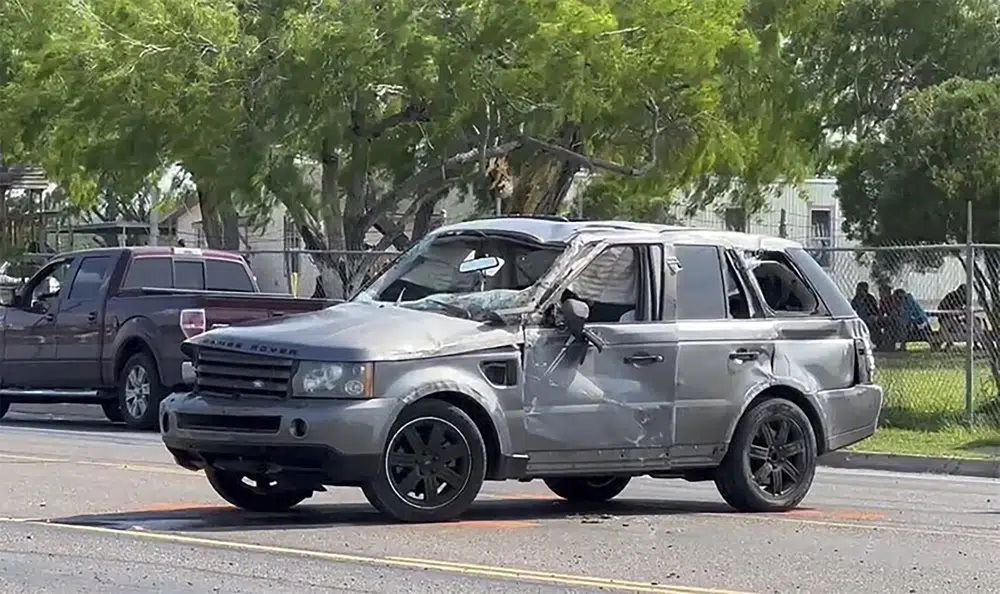 A damaged vehicle sits at the site of a deadly collision near a bus stop in Brownsville, Texas, on Sunday, May 7, 2023. 