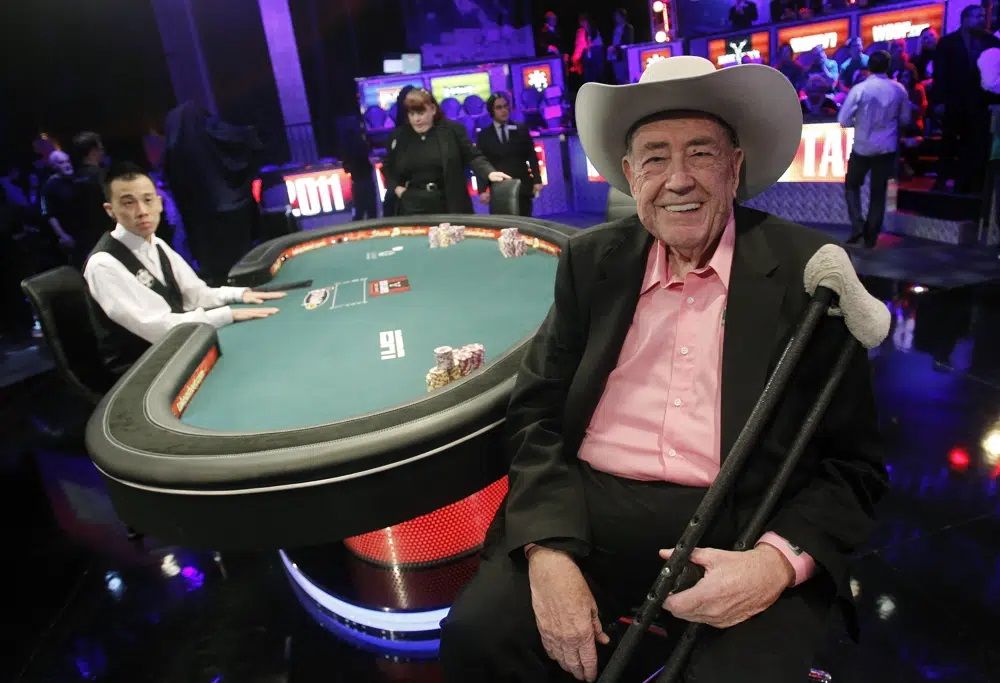 FILE - Doyle Brunson is pictured prior to play at the final table of the World Series of Poker on Nov. 8, 2011, in Las Vegas. Brunson, one of the most influential poker players of all time and a two-time world champion, died Sunday, May 14, 2023, according to his agent. He was 89. 