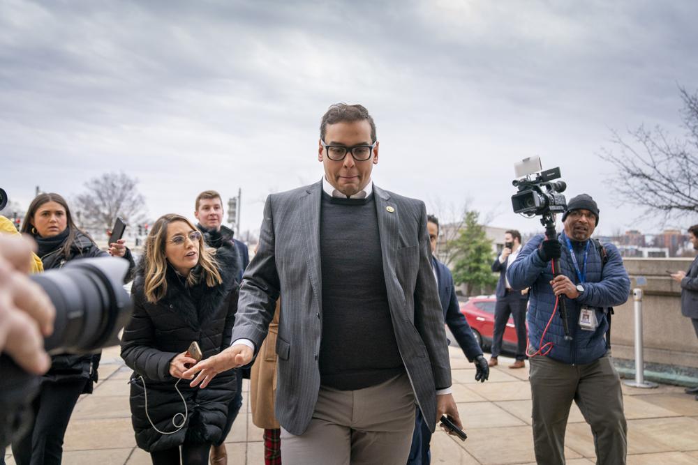 Rep. George Santos, R-N.Y., leaves a House GOP conference meeting on Capitol Hill in Washington, Jan. 25, 2023. Santos has been arrested on federal criminal charges. The Republican congressman has faced outrage over revelations he fabricated parts of his life story, including lying about being a wealthy Wall Street dealmaker. Santos was arrested Wednesday.