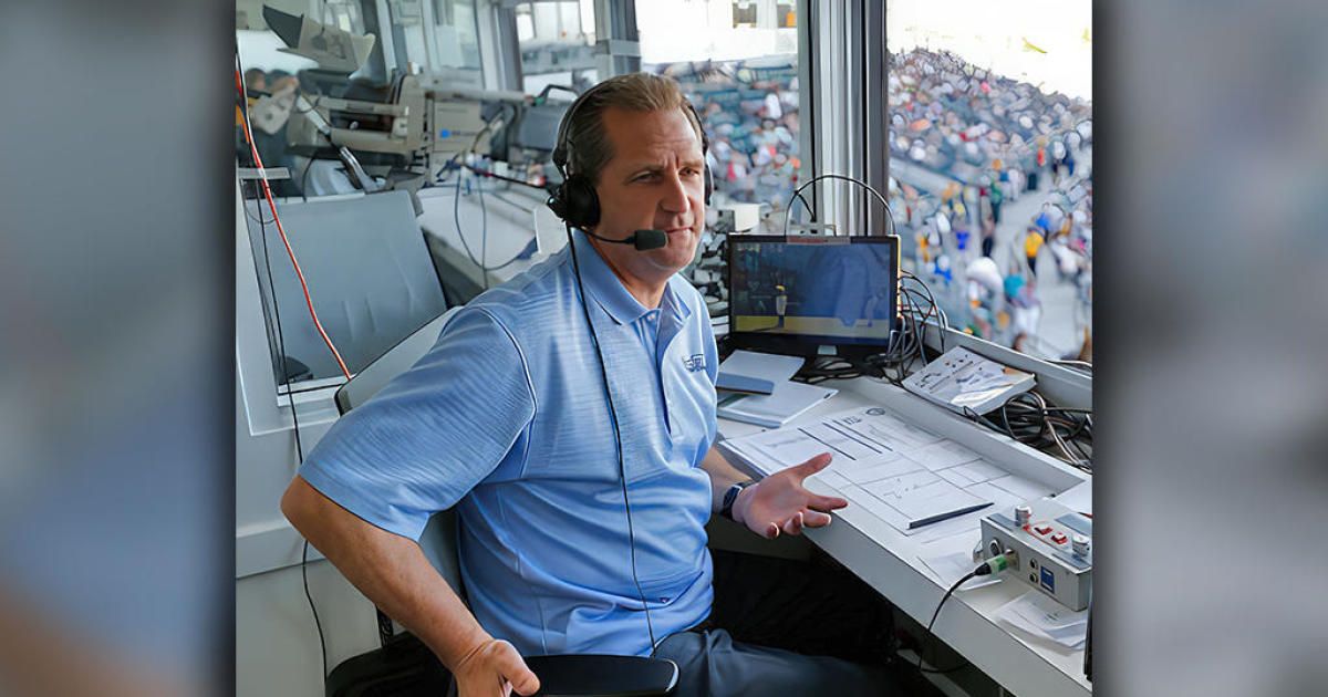 Broadcaster Glen Kuiper Jr. works from the pressbox during the game between the A's and the White Sox at Hohokam Stadium March 8, 2015 in Mesa, Arizona. (Michael Zagaris/Oakland Athletics/Getty Images)