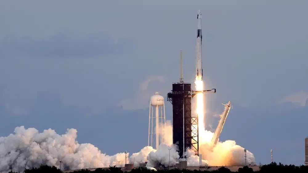 A SpaceX Falcon 9 rocket, with the Dragon capsule and a crew of four private astronauts lifts off from pad 39A, at the Kennedy Space Center in Cape Canaveral, Fla.,