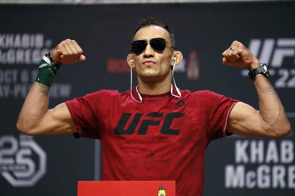 Tony Ferguson poses during a ceremonial weigh-in for the UFC 229 mixed martial arts fight, Friday, Oct. 5, 2018, in Las Vegas. UFC fighter Ferguson was arrested on a DUI charge in Hollywood early Sunday, May 7, 2023, after his truck slammed into several parked cars. 