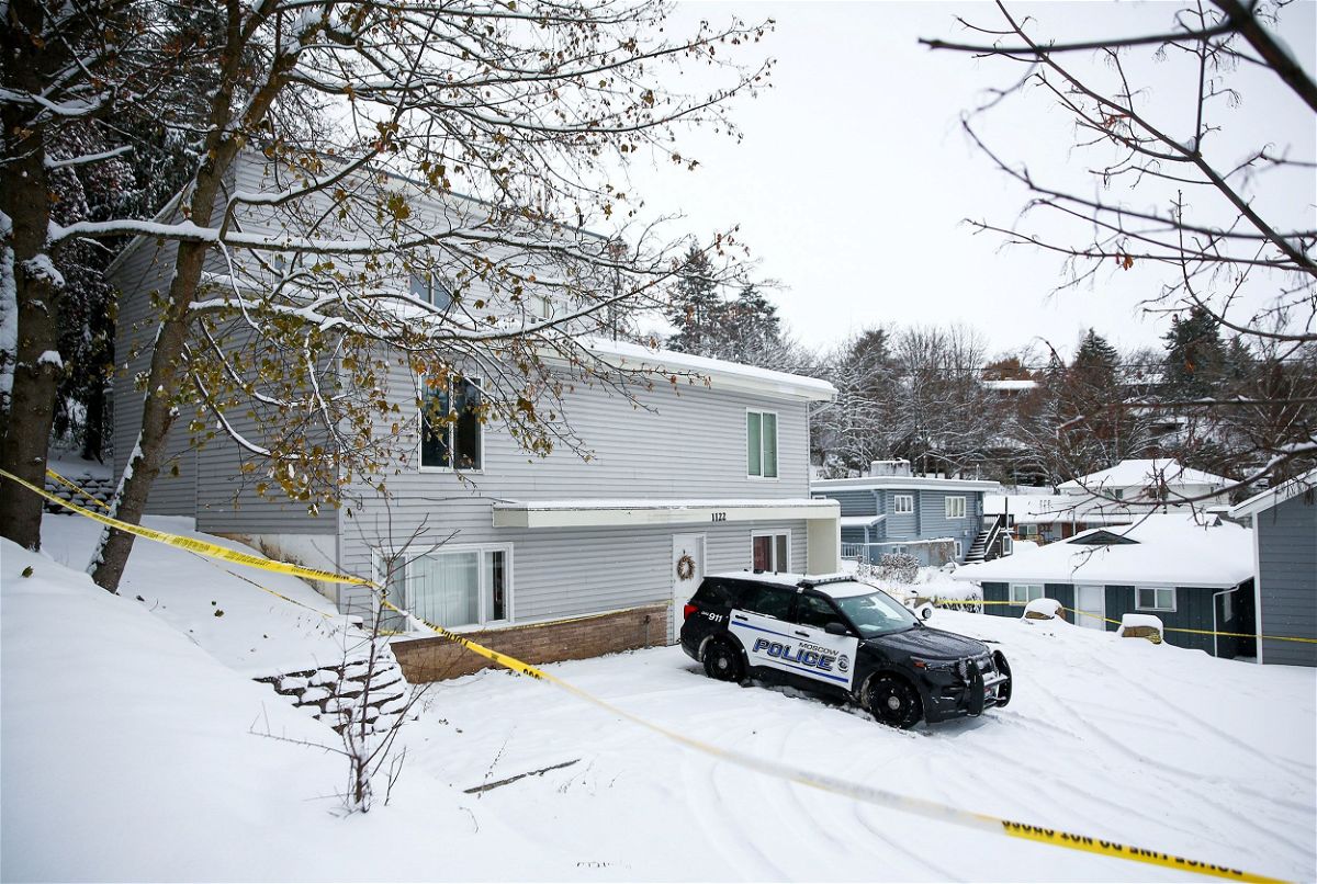 <i>Lindsey Wasson/Reuters</i><br/>Police tape surrounds the residence where four University of Idaho students were killed as police monitor the scene November 30 in Moscow