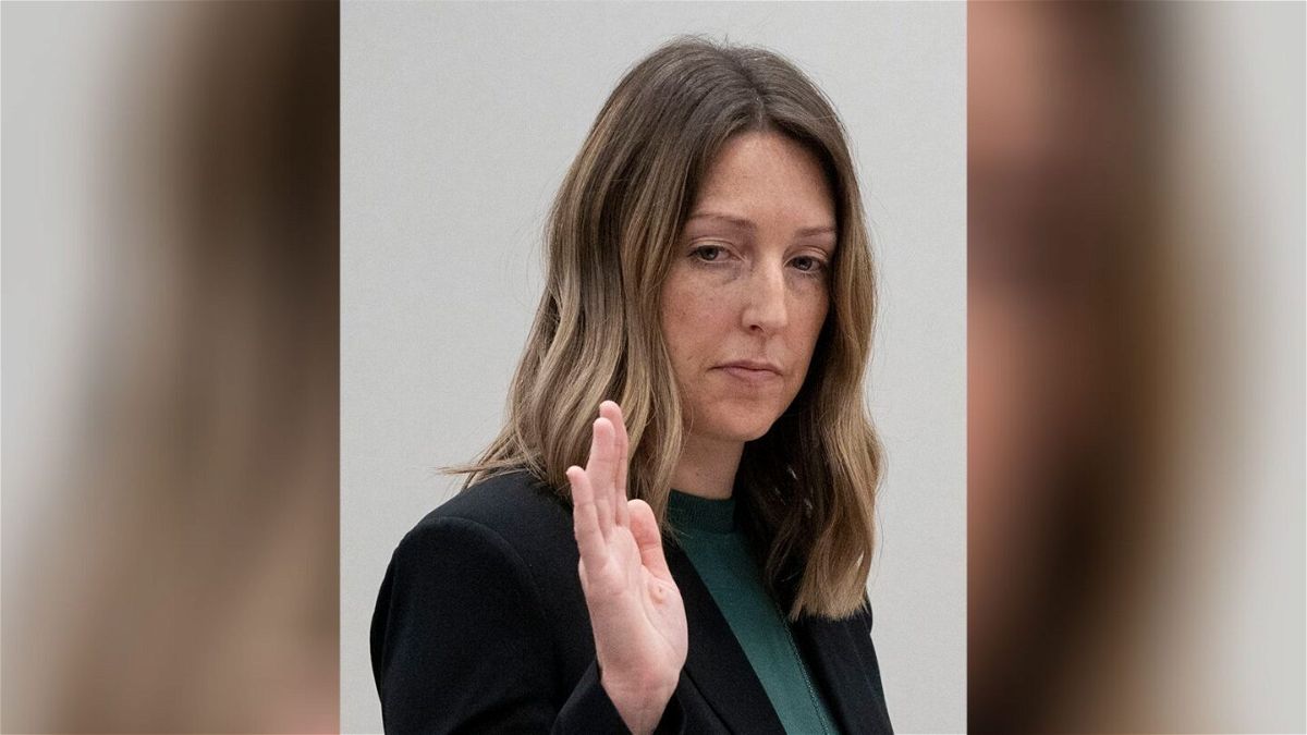 <i>Mykal McEldowney/AP</i><br/>Dr. Caitlin Bernard is sworn in during a hearing in front of the Indiana state medical licensing board on Thursday.