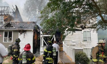 One firefighter died and six others were injured fighting a blaze in Columbia