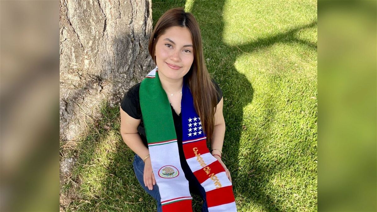 <i>Daisy Jasmin Estrada Borja/AP</i><br/>Naomi Peña Villasano poses with a sash of the Mexican and American flags.