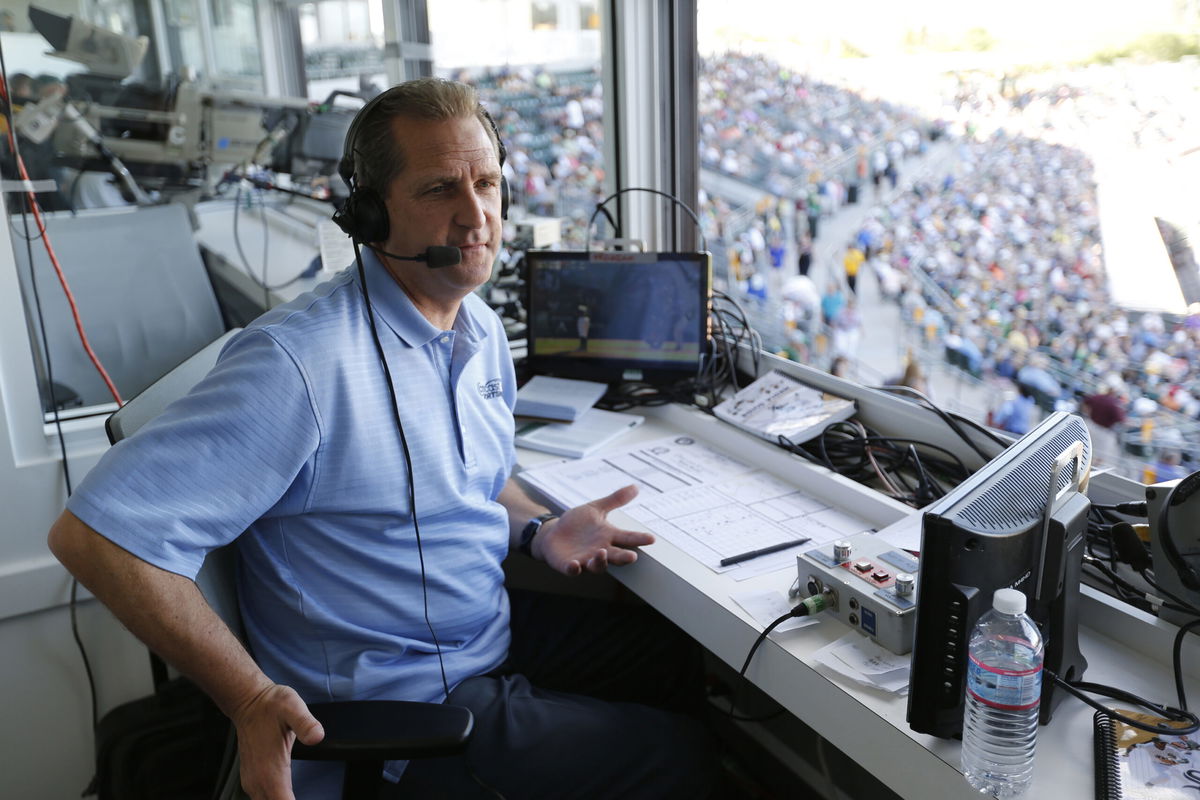 MESA, AZ - MARCH 8: Broadcaster Glen Kuiper Jr. of the Oakland Athletics works from the pressbox during the game against the Chicago White Sox at Hohokam Stadium on March 8, 2015 in Mesa, Arizona. (Photo by Michael Zagaris/Oakland Athletics/Getty Images)