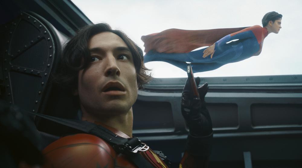 This image released by Warner Bros. Pictures shows Ezra Miller, left, and Sasha Calle in a scene from 