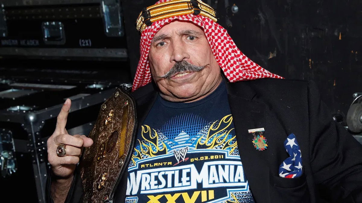 Iron Sheik poses backstage at Power 96.1's Jingle Ball 2013 at Philips Arena on December 11, 2013 in Atlanta, Georgia.