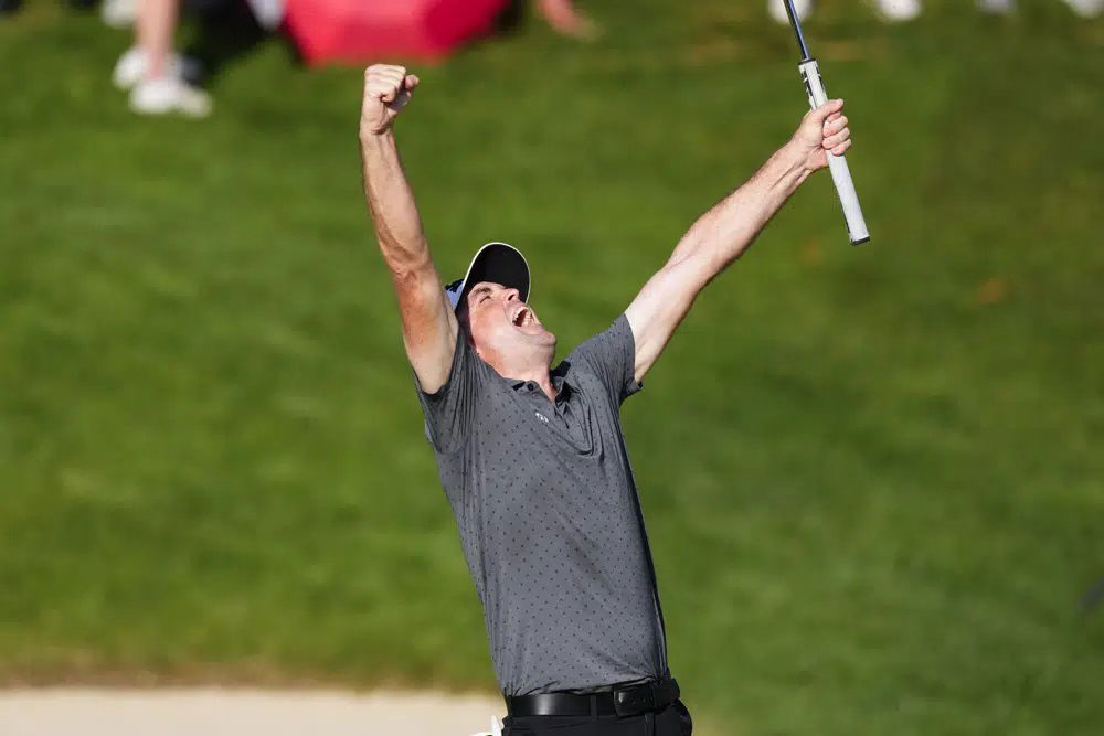 Keegan Bradley celebrates winning the Travelers Championship golf tournament at TPC River Highlands, Sunday, June 25, 2023, in Cromwell, Conn.