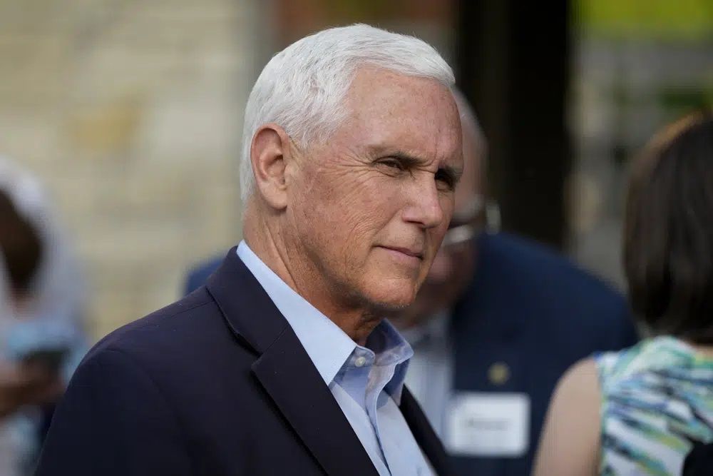 Former Vice President Mike Pence talks with local residents during a meet and greet on May 23, 2023, in Des Moines, Iowa. Pence will officially launch his widely expected campaign for the Republican nomination for president in Iowa on June 7. 