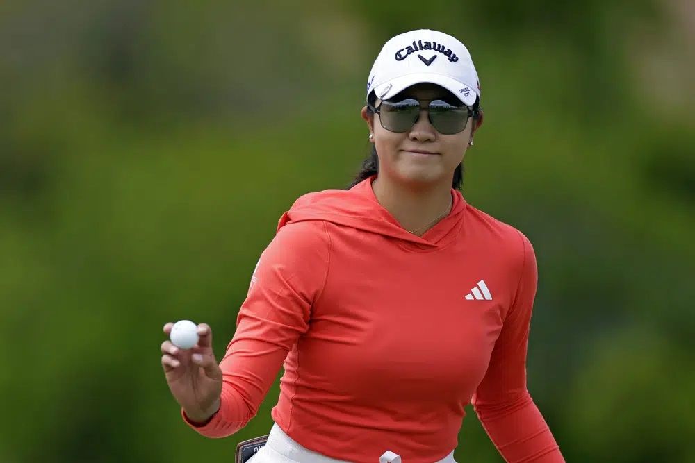 Rose Zhang reacts after her putt on the second green during the final round of the Mizuho Americas Open golf tournament, Sunday, June 4, 2023,