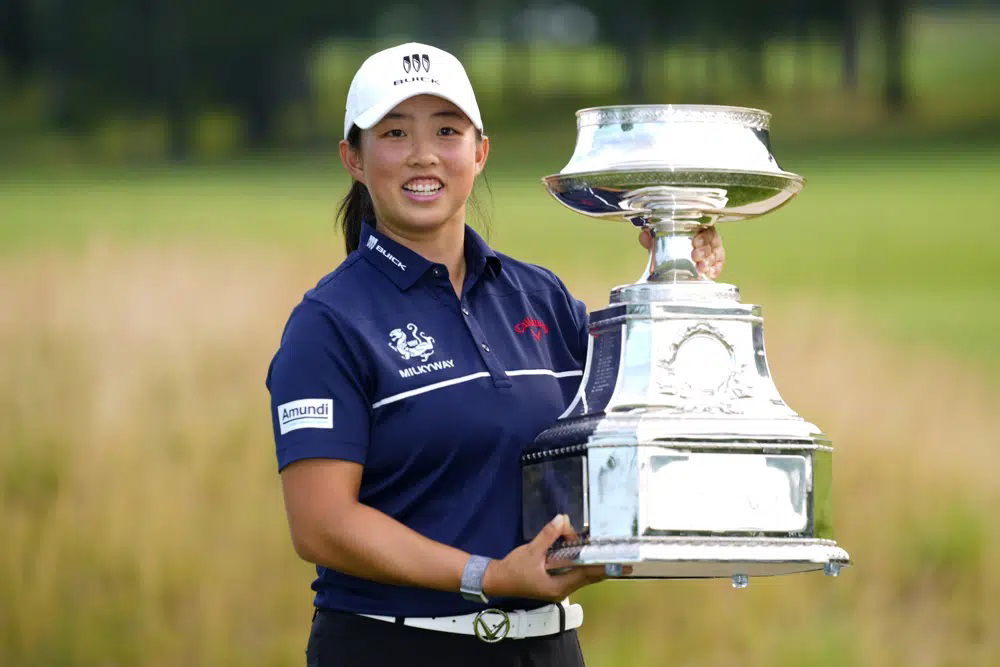 Ruoning Yin, of China, holds the trophy after winning the Women's PGA Championship golf tournament, Sunday, June 25, 2023, in Springfield, N.J.