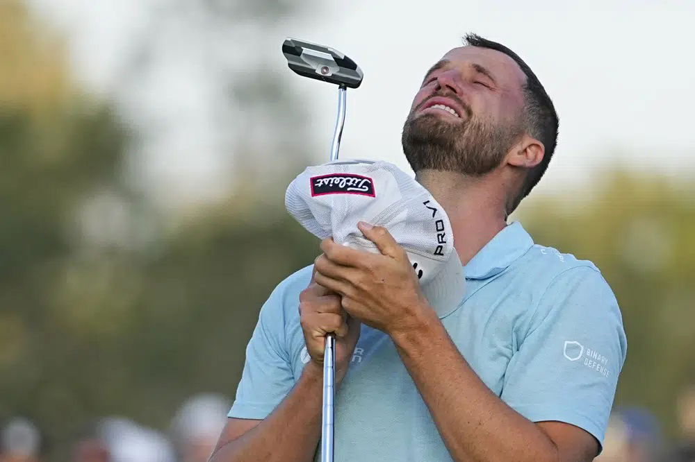 Wyndham Clark celebrates on the 18th hole after winning the U.S. Open golf tournament at Los Angeles Country Club on Sunday, June 18, 2023, in Los Angeles. (