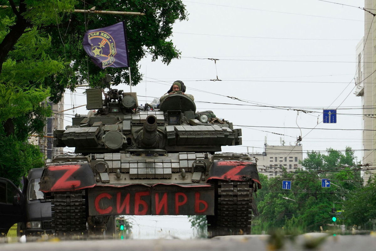 <i>Stringer/AFP/Getty Images</i><br/>Members of Wagner group sit atop of a tank in a street in the city of Rostov-on-Don on June 24.