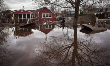 Water floods the Ocean Breeze neighborhood of New York City's Staten Island in 2012 after Superstorm Sandy.