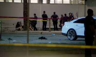 Denver police early Tuesday investigate a shooting that left at least nine people injured.