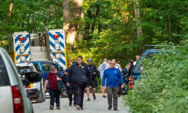 Search and rescue teams assemble before going to the site of Sunday's plane crash near Montebello