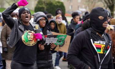 Demonstrators protest a day after a grand jury decided against indicting police officers involved in the fatal shooting of Jayland Walker