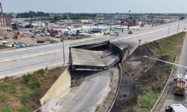 A view of the aftermath of the collapse of a part of I-95 highway after a fuel tanker exploded beneath it