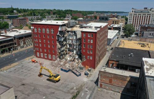 Three people are still unaccounted for after an apartment building partially collapsed on May 28 in Davenport
