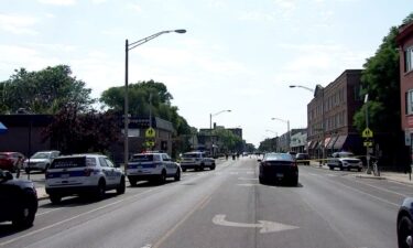 Police on the scene of a shooting at a funeral procession in Oak Park