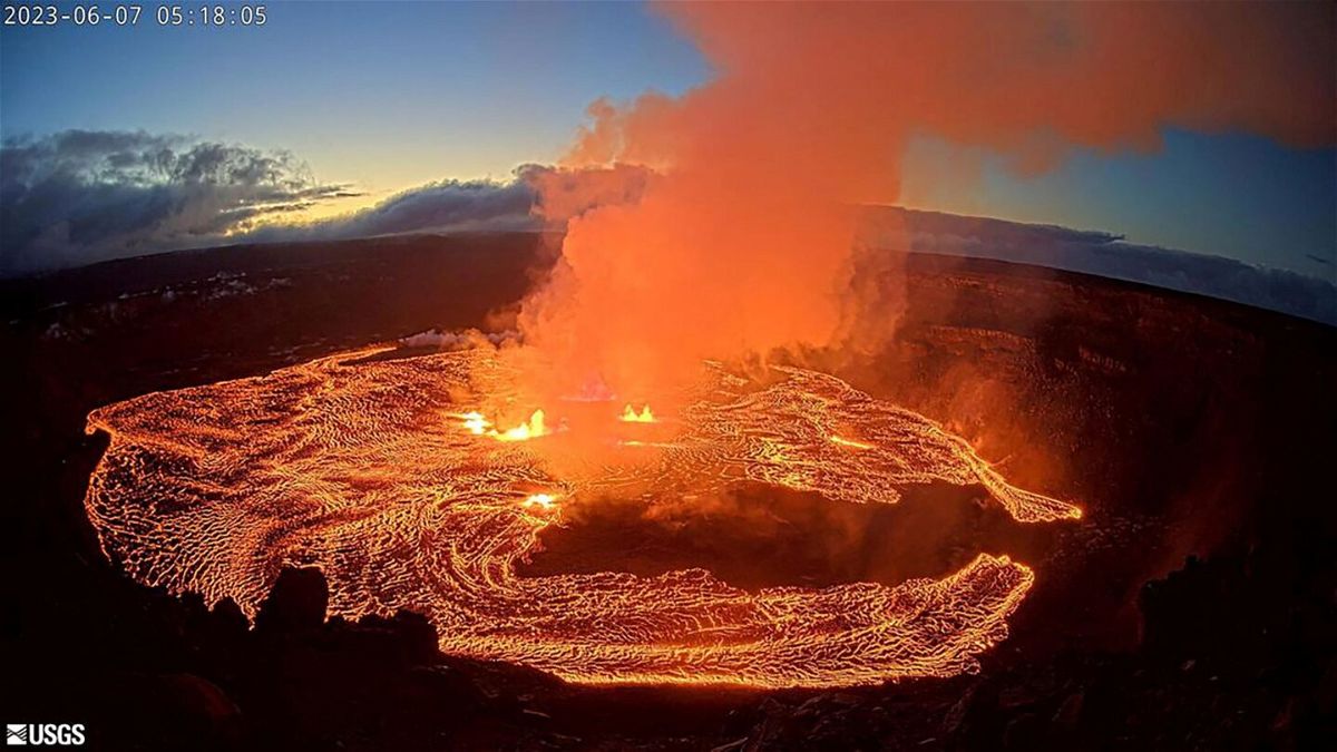 <i>USGS/Handout via Reuters</i><br/>A lava lake forms at Halemaʻumaʻu as seen from the west rim of the Kilauea caldera during the volcano's eruption in Hawaii