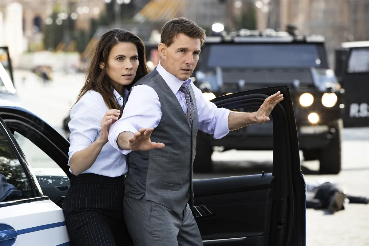 This image released by Paramount Pictures shows Hayley Atwell, left and Tom Cruise in a scene from 