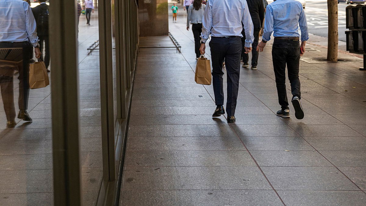 <i>David Paul Morris/Bloomberg/Getty Images</i><br/>Pictured are pedestrians on California Street in the financial district of San Francisco