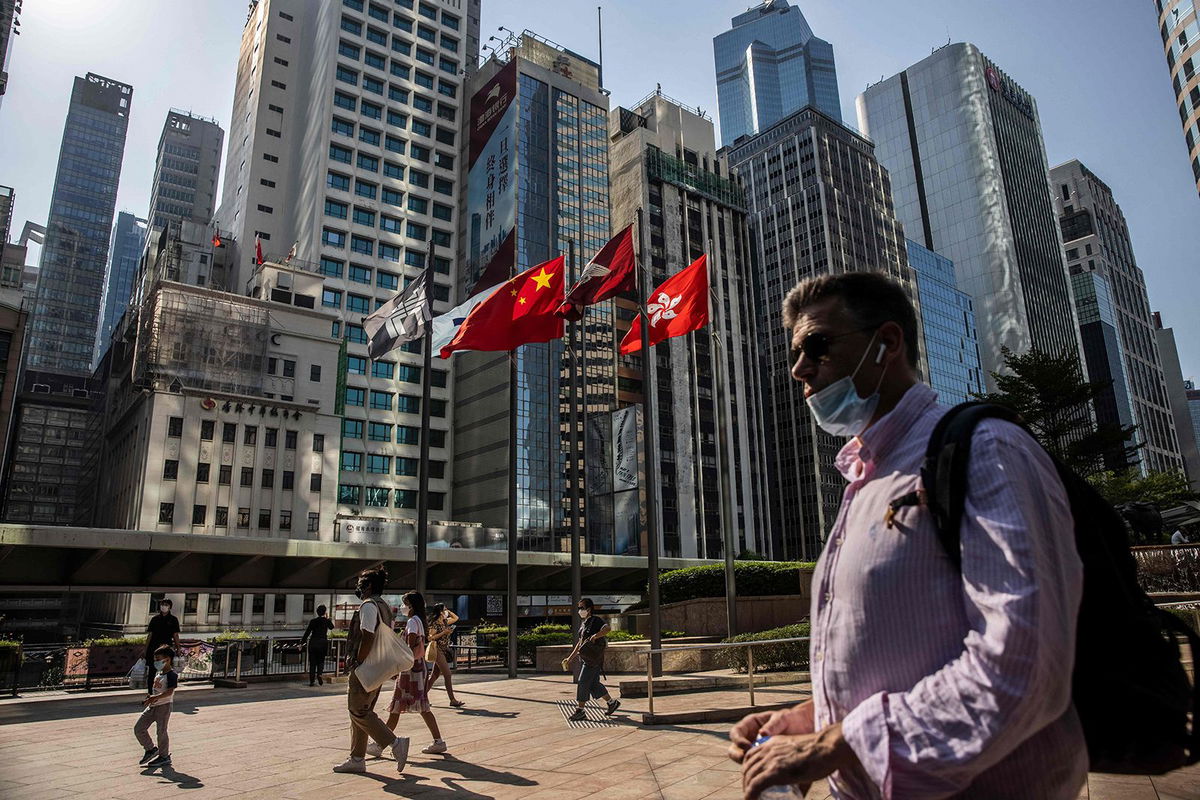 <i>Isaac Lawrence/AFP/Getty Images/File</i><br/>People walk through Exchange Square in Hong Kong on October 28