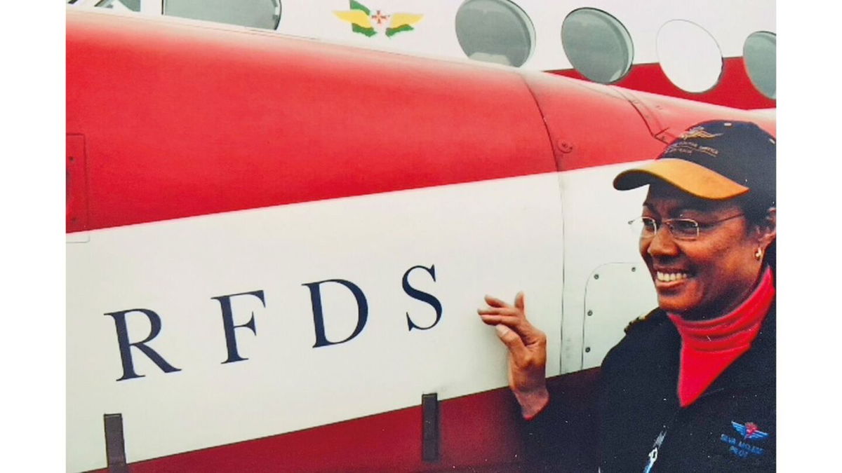 <i>Silva McLeod</i><br/>Silva McLeod in front of a Royal Flying Doctor Service plane. She worked for the RFDS as a pilot.