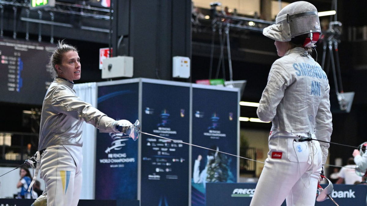 <i>Tadashi Miyamoto/AFLO/Shutterstock</i><br/>Kharlan offers Smirnova her sabre during their world championships match.