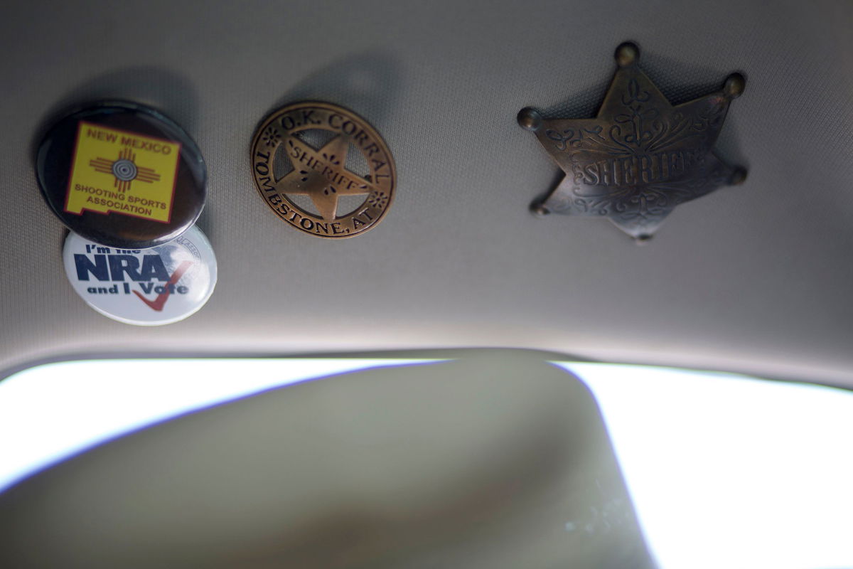 <i>Adria Malcolm/Reuters</i><br/>NRA and sheriff buttons are affixed to the roof of then-Sheriff Mace's truck in 2019.